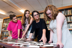 (left to right) Emily Moore, U-M Stamps School of Art & Design graduate (2015), Molly Berkowitz, U-M Undergraduate, History and Women’s Studies, Martha Jones, U-M professor of African American History, and Katie Diekman,U-M History and Women’s Studies graduate (2015). Photograph by Daryl Marshke 