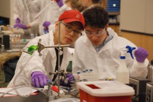 Undergraduate biology students Christopher Hu, left, and John Fan are part of a laboratory class in which students analyze the microbes that live in their own digestive systems. Teams of students use class data to test a hypothesis about the gut microbiome. For example, do the students’ microbial communities differ based on what dorm they live in? Photo by Dale Austin.