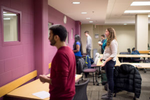 Amar Ambani, Hayley Rogers, Sneha Rajen and Tom Kidd address the wall, as they practice their Ted Talks.