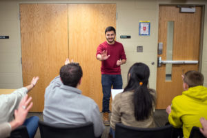 Amar Ambani practices his talk in front of the class.