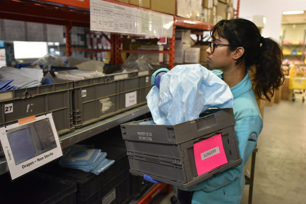 Student volunteer performing tasks