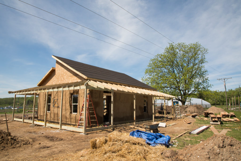 The straw bale building pictured from the back