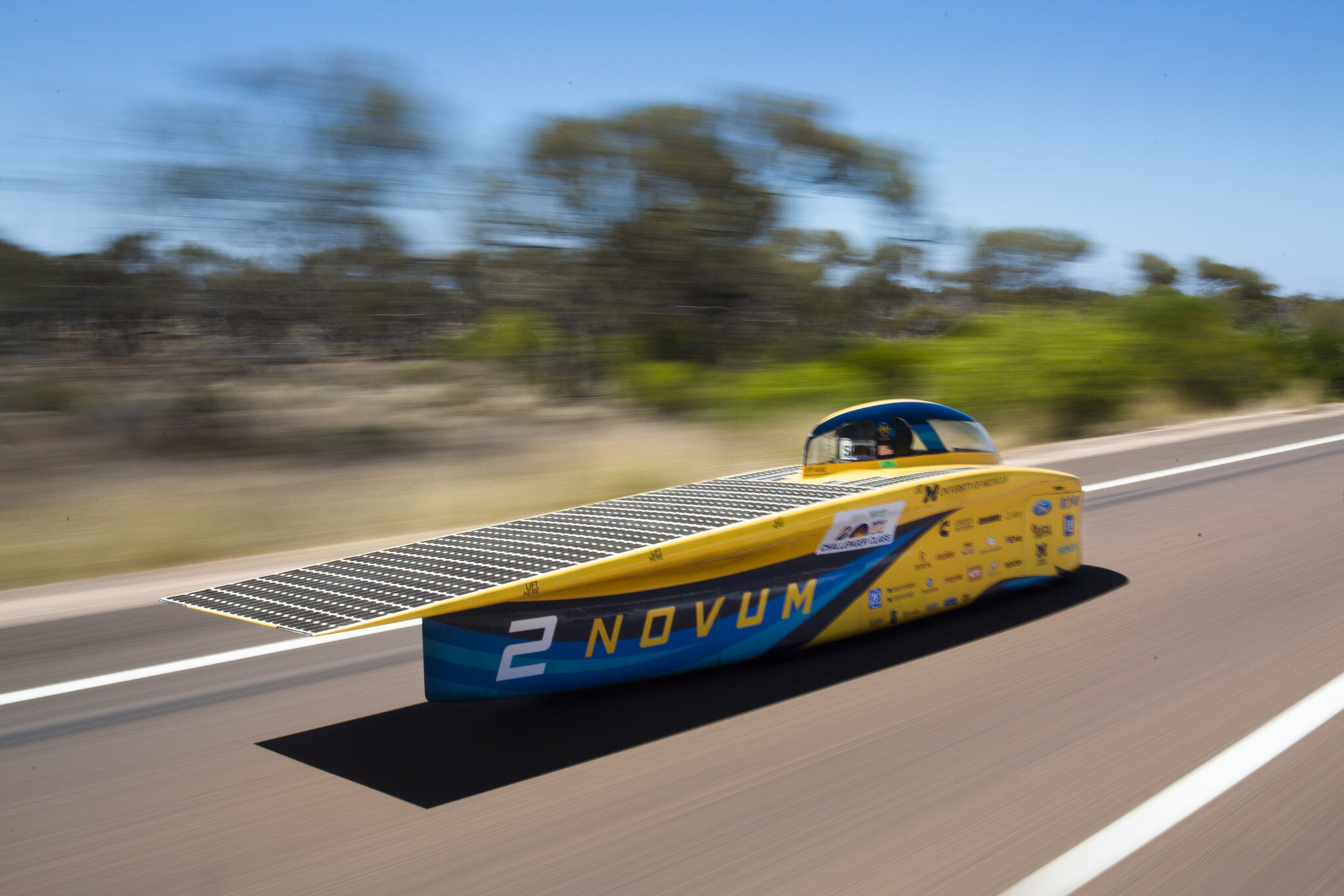 The University of Michigan Solar Car Novum speeds down the Stuart Highway in Australia in the 2017 World Solar Challenge. The team will soon race Novum in the American Solar Challenge on the Oregon Trail. Photo by Evan Dougherty