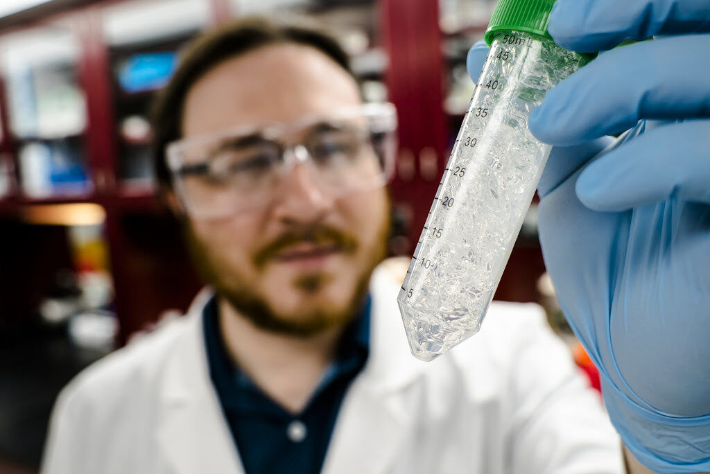 Scientist with test tube