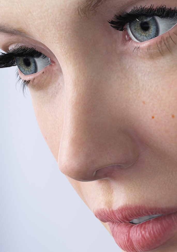 Close up of woman's face with blue eyes