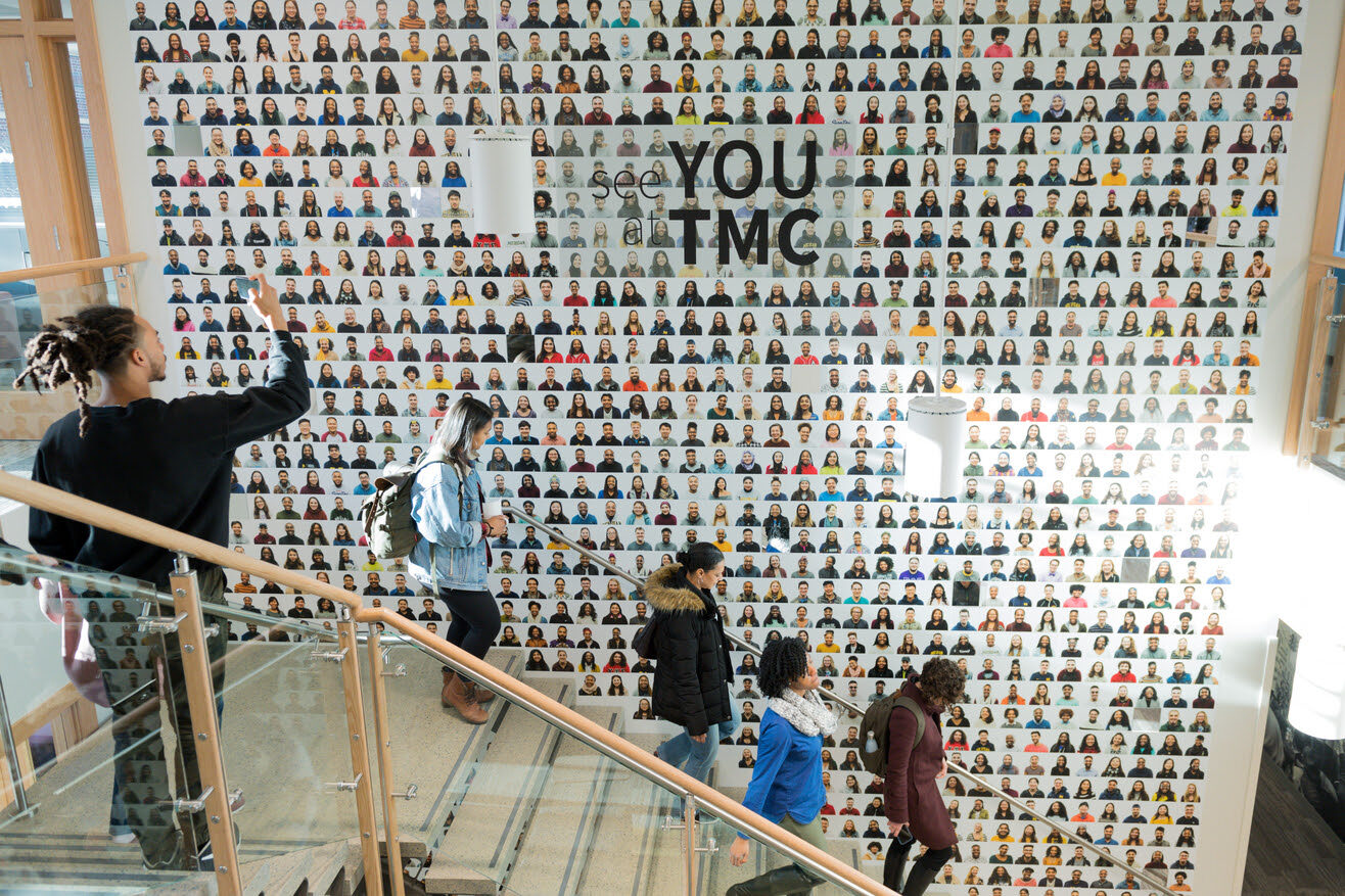 Students walk down the stairs of the new Trotter Multicultural Center.