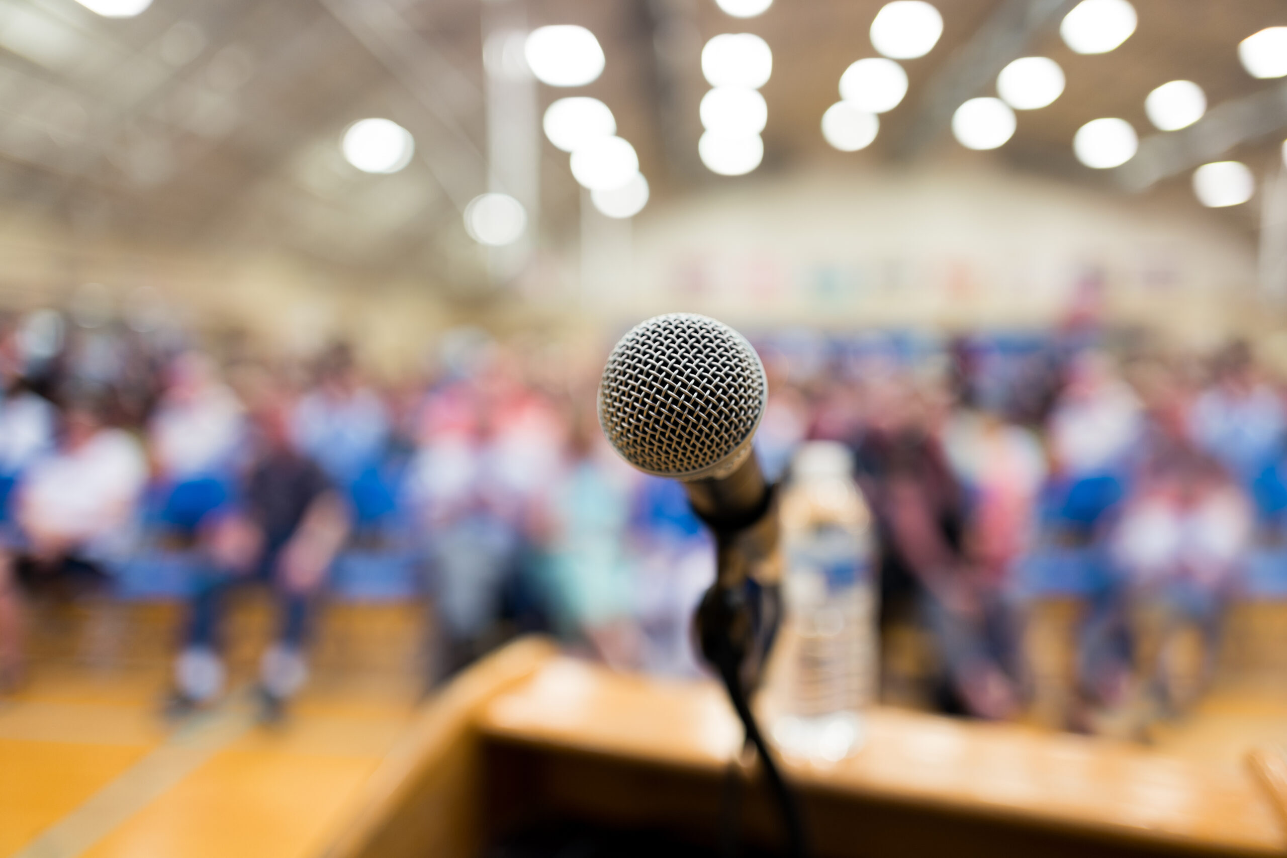 Close up of microphone on a podium in an auditorium